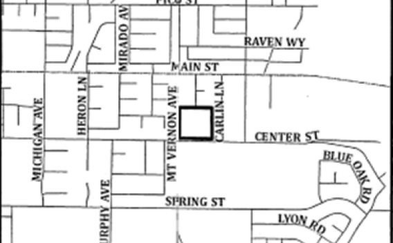 Map showing streets of a neighborhood with labeled roads like Main St and Spring St. A square marks an area at Mt Vernon Ave and Carlin Ln.
